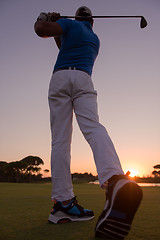 Image showing golfer hitting long shot