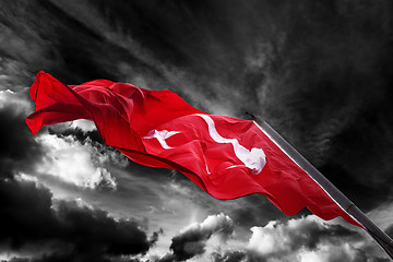 Image showing Flag of Turkey waving against black and white sky