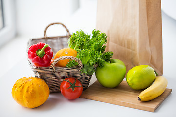 Image showing basket of fresh friuts and vegetables at kitchen