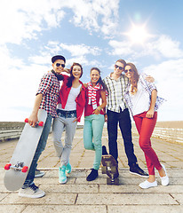 Image showing teenagers with skates outside