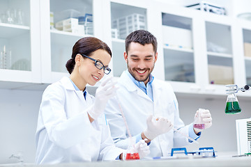 Image showing young scientists making test or research in lab