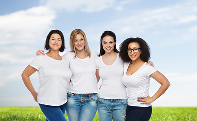 Image showing group of happy different women in white t-shirts