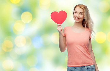 Image showing happy woman or teen girl with red heart shape