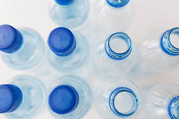 Image showing close up of bottles with drinking water on table