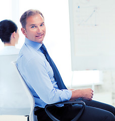 Image showing businessman on business meeting in office