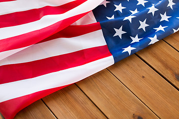 Image showing close up of american flag on wooden boards