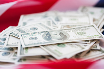 Image showing close up of american flag and dollar cash money