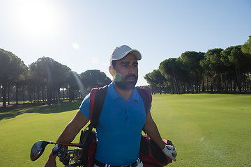 Image showing golf player walking