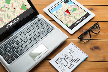 Image showing close up of on laptop, tablet pc and notebook