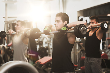 Image showing group of men with barbells in gym