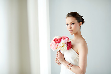 Image showing beautiful asian woman with flower and jewelry