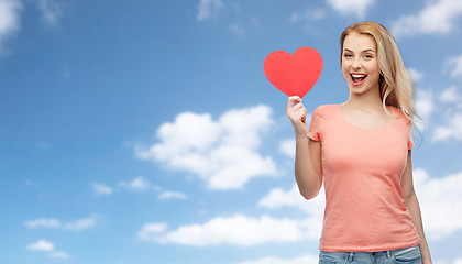 Image showing happy woman or teen girl with red heart shape