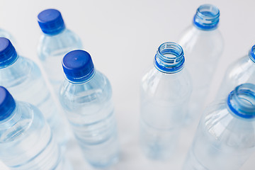 Image showing close up of bottles with drinking water on table