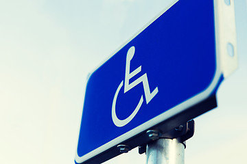 Image showing close up of road sign for disabled outdoors