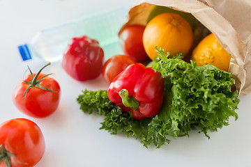 Image showing basket of fresh vegetables and water at kitchen