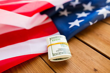 Image showing close up of american flag and dollar cash money