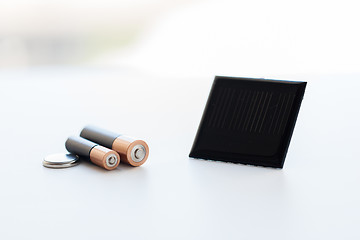 Image showing close up of alkaline batteries and solar cell