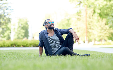 Image showing man in sunglasses at city street or park