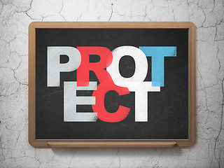 Image showing Protection concept: Protect on School board background