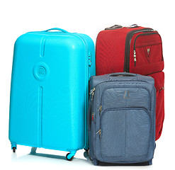 Image showing The modern suitcases on white background