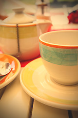 Image showing cup of tea and teapot