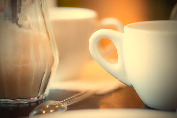 Image showing cup with tea, spoon and sugar