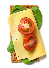 Image showing crispbread with cheese and tomato