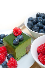 Image showing green tea matcha mousse cake with berries