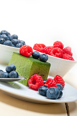 Image showing green tea matcha mousse cake with berries