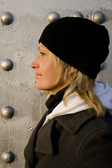 Image showing The blonde on a background of a silvery wall