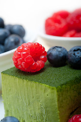 Image showing green tea matcha mousse cake with berries