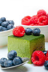 Image showing green tea matcha mousse cake with berries