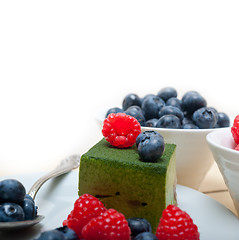 Image showing green tea matcha mousse cake with berries