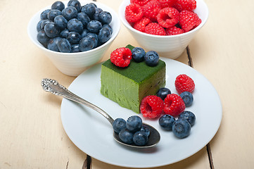 Image showing green tea matcha mousse cake with berries