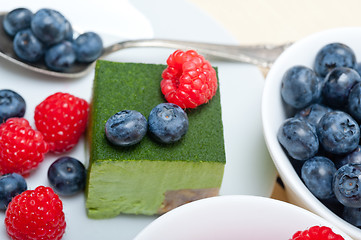 Image showing green tea matcha mousse cake with berries