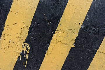 Image showing Yellow and black concrete barrier