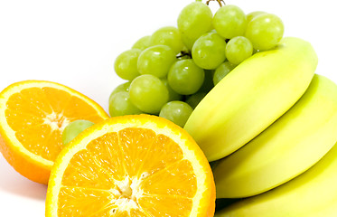 Image showing grapes, bananas and two halves of orange