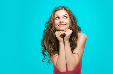 Image showing The young woman\'s portrait with happy emotions