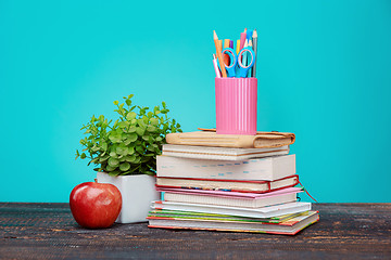 Image showing Back to School concept. Books, colored pencils and apple