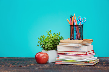 Image showing Back to School concept. Books, colored pencils and apple