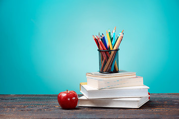 Image showing Back to School concept. Books, colored pencils and apple