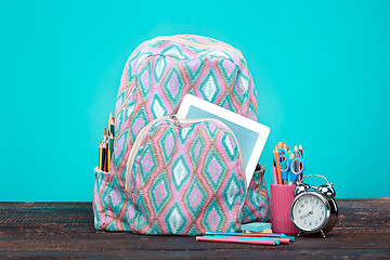 Image showing Back to School concept. Books, colored pencils and backpack