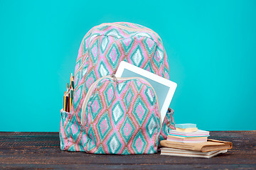 Image showing Back to School concept. Books, colored pencils and backpack