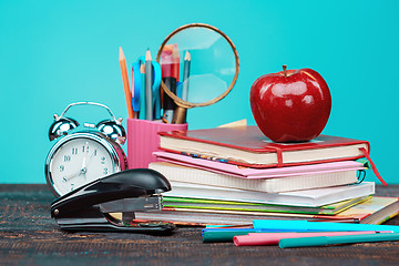 Image showing Back to School concept. Books, colored pencils and clock