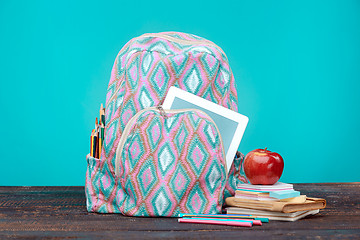 Image showing Back to School concept. Books, colored pencils and backpack