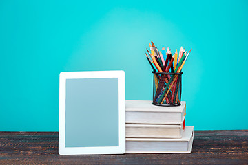 Image showing Back to School concept. Books, colored pencils and laptop