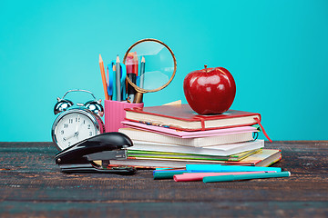 Image showing Back to School concept. Books, colored pencils and clock