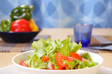 Image showing Table with salad bowls