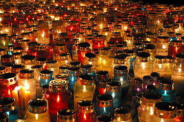 Image showing Memorial candles shining at the cemetery on the All Saints Day