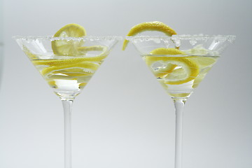 Image showing Martini with sugar crust, lemon and peels